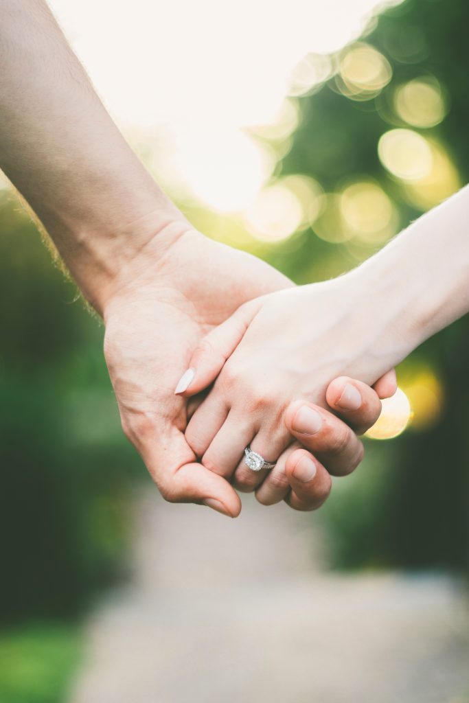 couple holding hands